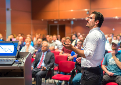 Analyst presenting to a conference